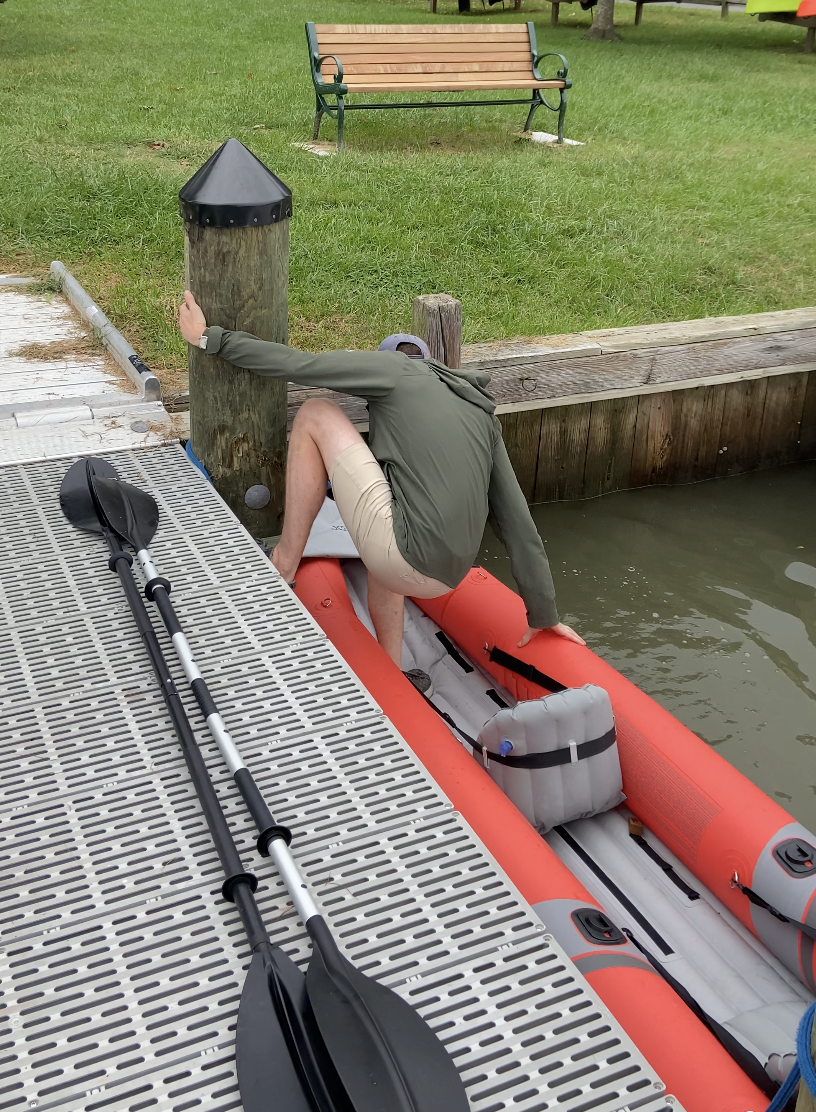 Jacob getting in the kayak